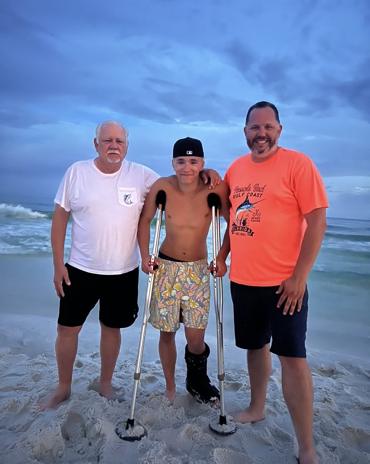 Jason and his dad at the beach