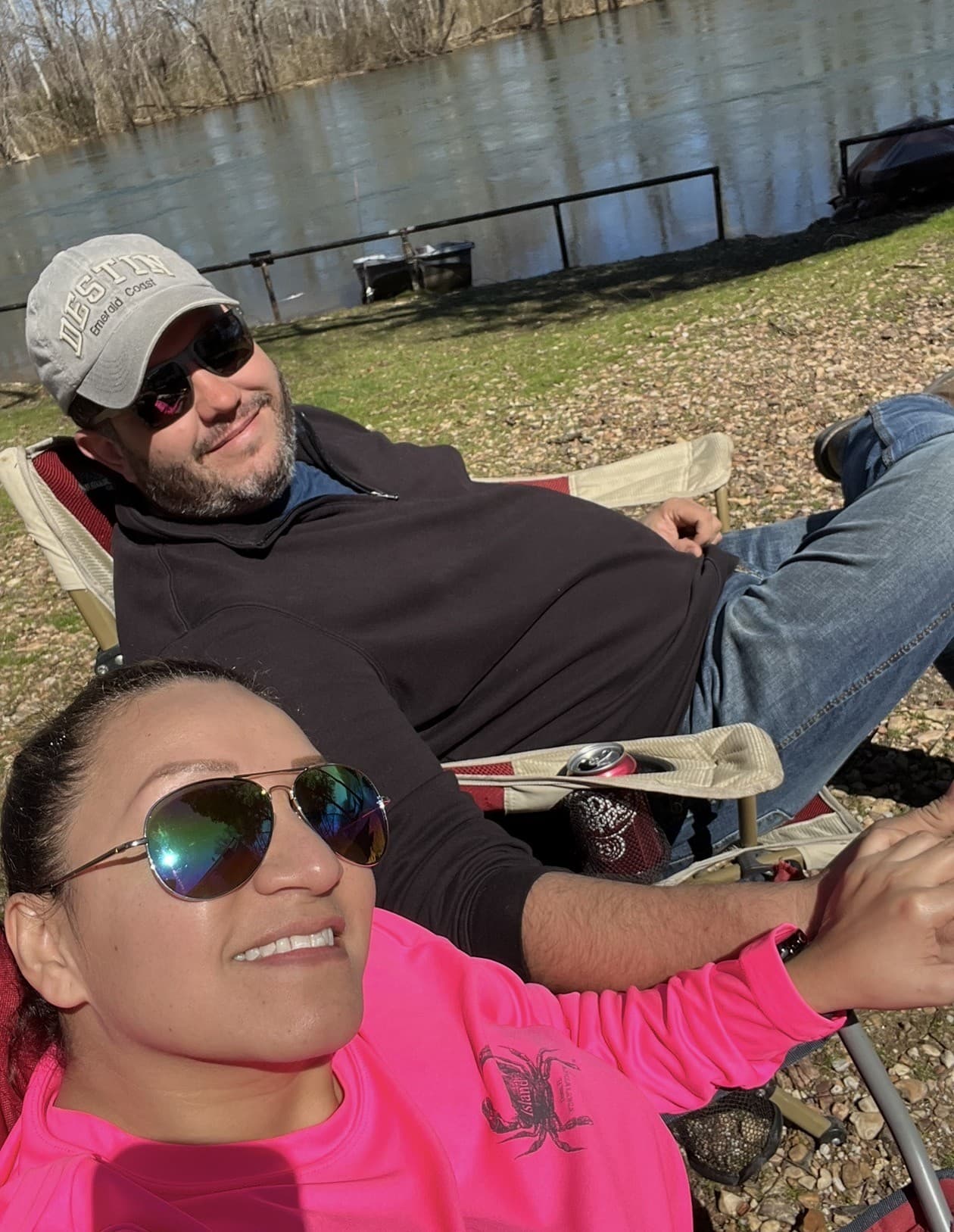 Jason and Maria relaxing by the water
