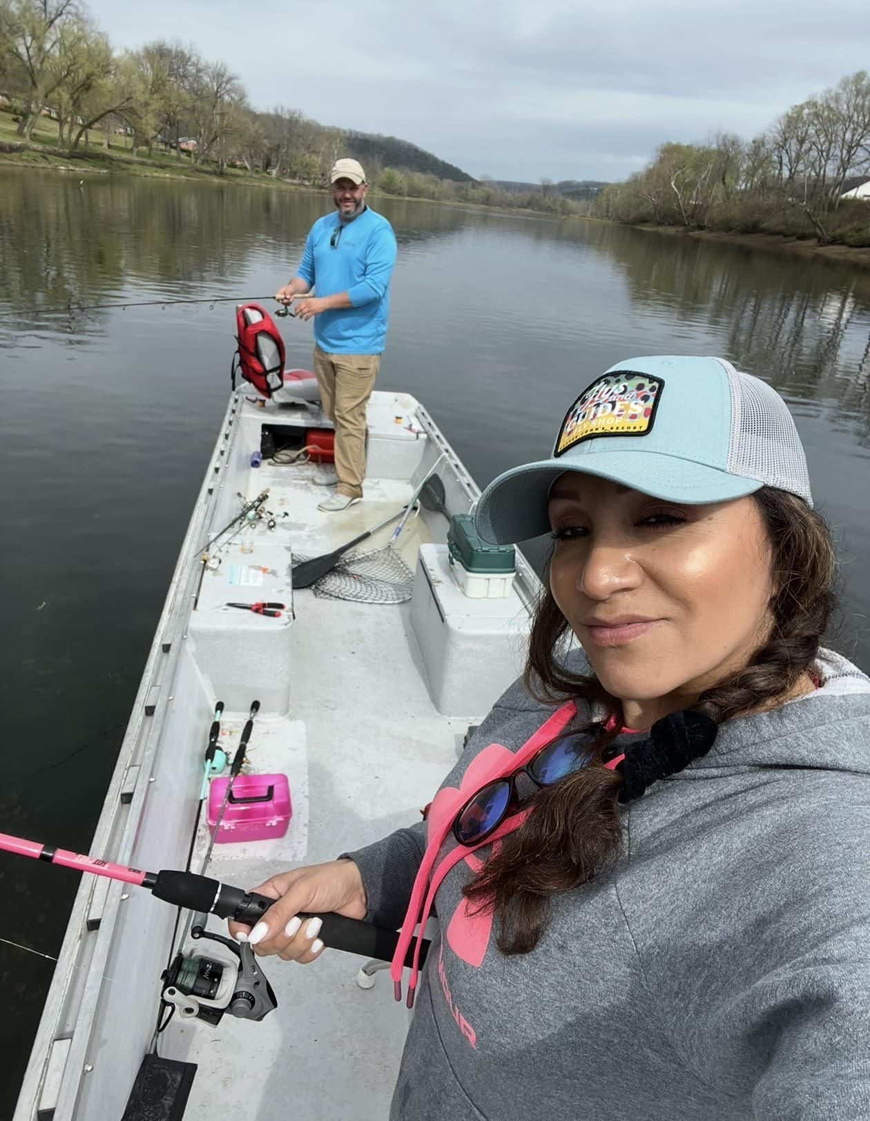 Jason and Maria fishing on the river